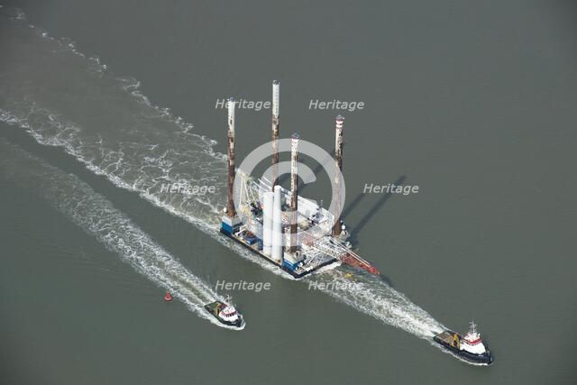 Wind farm construction vessel en route to a construction site, Harwich Harbour, Suffolk, c2010s(?). Artist: Damian Grady.