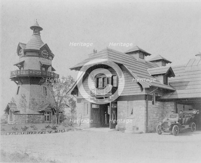 Windmill-shaped clock tower at left, and part of garage of Edmund..., Greenwich, Connecticut, 1908. Creator: Frances Benjamin Johnston.