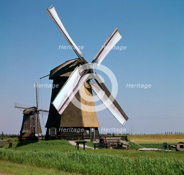 Windmills in Holland. Artist: Unknown
