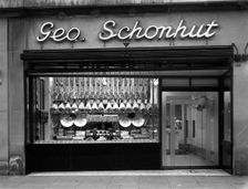 Window of George Schonhut's butcher's shop, Barnsley, South Yorkshire, 1955. Creator: Michael Walters