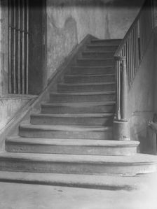 Window and stairway in the old Ursuline convent, New Orleans, between 1920 and 1926. Creator: Arnold Genthe