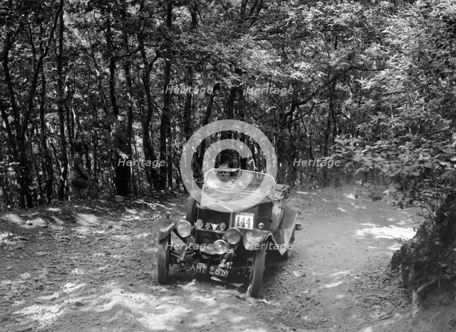 Windsor of CC Bliss competing in the B&HMC Brighton-Beer Trial, Fingle Bridge Hill, Devon, 1934. Artist: Bill Brunell.