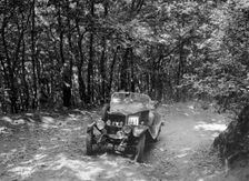 Windsor of CC Bliss competing in the B&HMC Brighton-Beer Trial, Fingle Bridge Hill, Devon, 1934. Artist: Bill Brunell