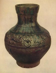 Wine Jar with Hunting Scene in Relief. Han Dynasty, 206 BC - AD 221, (1927). Artists: Edward F Strange, Unknown