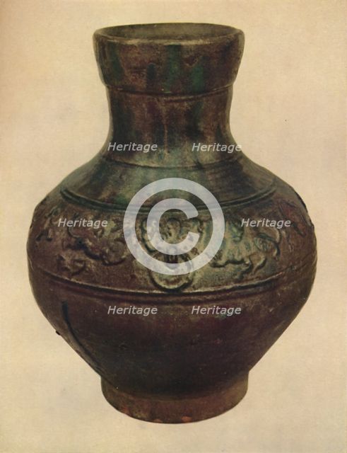 'Wine Jar with Hunting Scene in Relief. Han Dynasty, 206 BC - AD 221, (1927). Artists: Edward F Strange, Unknown.