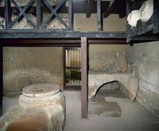 Wine shop, House of Neptune and Amphitrite, Herculaneum, Italy, 2002. Creator: LTL