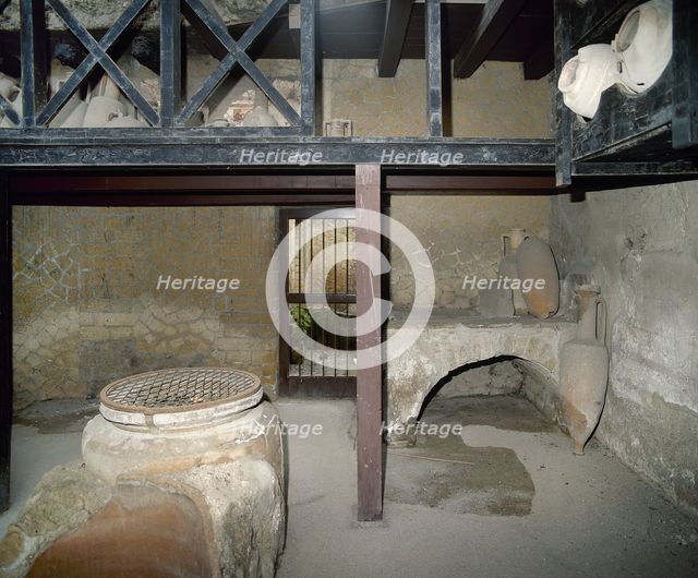 Wine shop, House of Neptune and Amphitrite, Herculaneum, Italy, 2002. Creator: LTL.