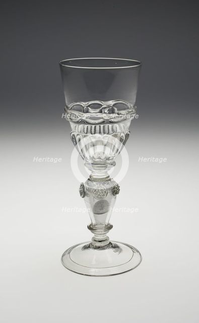Wineglass Containing Two Uncirculated Charles II Silver Coins Dated 1670 and 1671, , c. 1690-1710. Creator: Unknown.