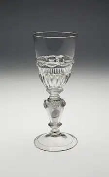 Wineglass Containing Two Uncirculated Charles II Silver Coins Dated 1670 and 1671, , c. 1690-1710. Creator: Unknown