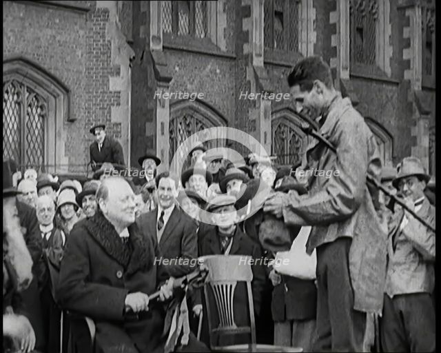 Winston Churchill, Chancellor of the Exchequer, Being Presented With an Irish Cap in Front..., 1926. Creator: British Pathe Ltd.
