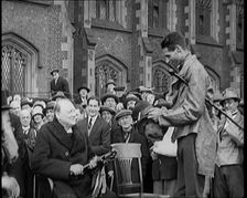 Winston Churchill, Chancellor of the Exchequer, Being Presented With an Irish Cap in Front..., 1926. Creator: British Pathe Ltd
