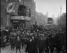 Winston Churchill, Chancellor of the Exchequer, Being Taken Through Crowd Filled Streets on..., 1926 Creator: British Pathe Ltd