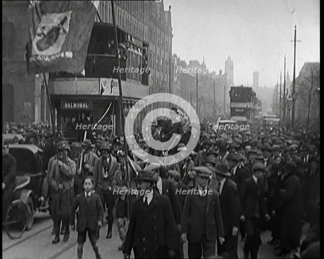 Winston Churchill, Chancellor of the Exchequer, Being Taken Through Crowd Filled Streets on..., 1926 Creator: British Pathe Ltd.