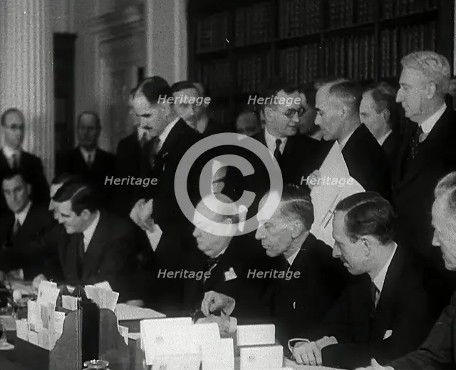 Winston Churchill and Wendell Willkie Signing an Agreement Allowing the USA to use British..., 1941. Creator: British Pathe Ltd.