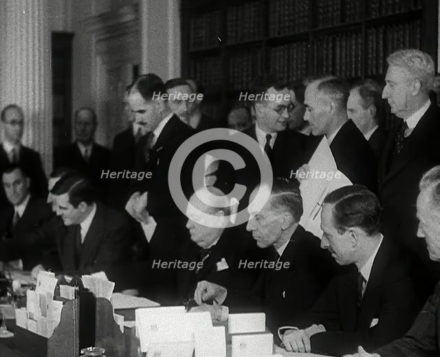 Winston Churchill and Wendell Willkie Signing an Agreement Allowing the USA to use British..., 1941. Creator: British Pathe Ltd.