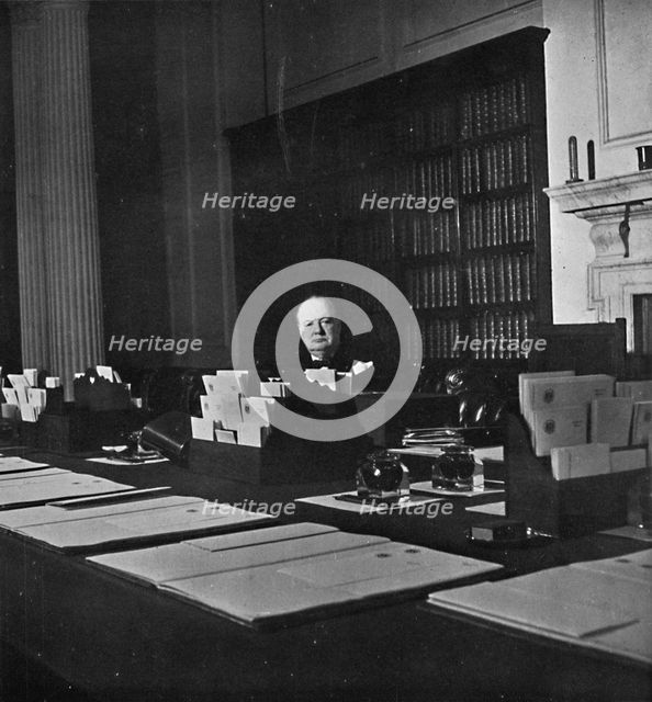 Winston Churchill in the Cabinet Room of 10 Downing Street', c1940s, (1945). Artist: Unknown.