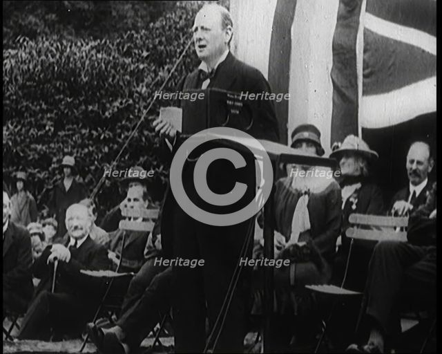 Winston Churchill Making a Speech from a Platform Infront of a Small Crowd, 1924. Creator: British Pathe Ltd.