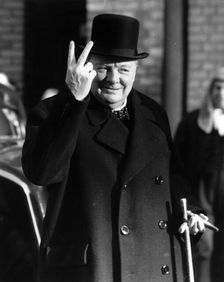 Winston Churchill making his famous V for Victory sign, 1942. Creator: Unknown