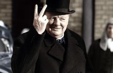 Winston Churchill making his famous V for Victory sign, 1942. Artist: Unknown