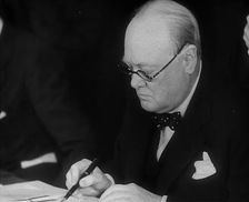 Winston Churchill Signing an Agreement Allowing the USA to use British Naval Bases in..., 1941. Creator: British Pathe Ltd