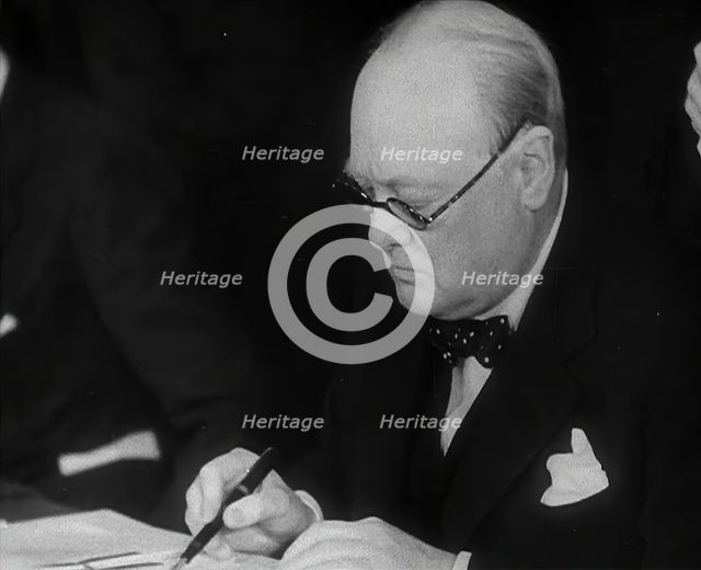Winston Churchill Signing an Agreement Allowing the USA to use British Naval Bases in..., 1941. Creator: British Pathe Ltd.
