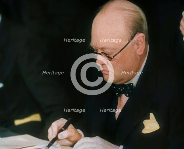 Winston Churchill Signing an Agreement Allowing the USA to use British Naval Bases in..., 1941. Creator: British Pathe Ltd.