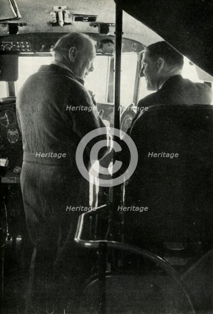 Winston Churchill talking to Captain Shakespeare of the flying boat 'Berwick', c1939-c1944 (1946). Creator: Unknown.