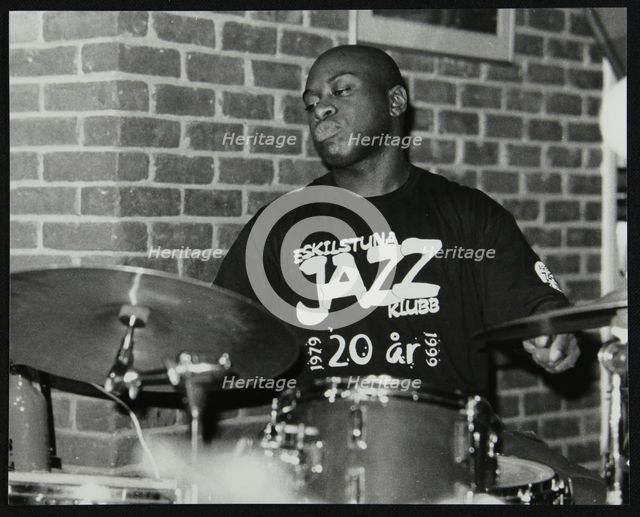 Winston Clifford on drums at The Fairway, Welwyn Garden City, Hertfordshire, 18 February 2001. Creator: Denis Williams.