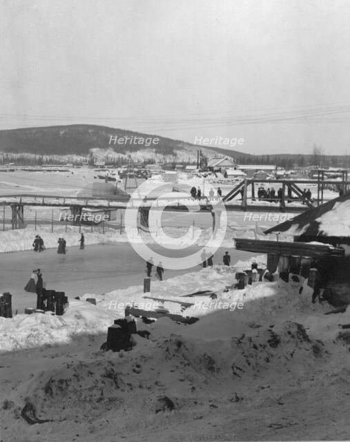 Winter bridge over river, between c1900 and c1930. Creator: Unknown.