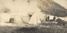 Winter camp of the survey party on the river bank., 1909. Creator: Vladimir Ivanovich Fedorov