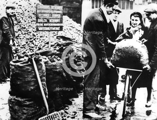 Winter relief, distribution of coal, France 1940-1944. Artist: Unknown
