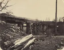 Winter Scene with Trestle Bridge Along the Atlantic & Great Western Railway, 1862-64. Creator: James Fitzallen Ryder