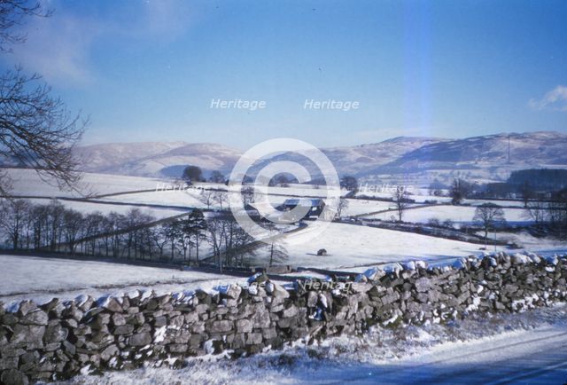 Winter Snow on the Pennines in Kirkby Lonsdale, Cumbria, England, 20th century. Artist: CM Dixon.