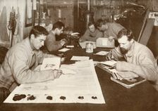 Winter Work (Left to right - Debenham, Cherry-Garrard, Bowers, Evans, Taylor) c1911, (1913). Artist: Herbert Ponting