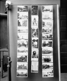 Wire postcard display rack, between 1900 and 1910. Creator: Unknown