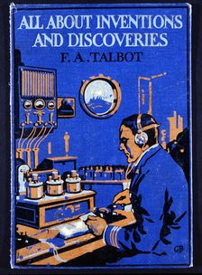 Wireless officer sending a message by Morse Code from on board a ship, 1916