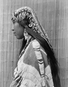 Wisham (i.e. Wishran) girl, profile, c1910. Creator: Edward Sheriff Curtis