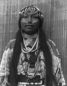 Wishham (i.e., Wishram) girl, c1910. Creator: Edward Sheriff Curtis