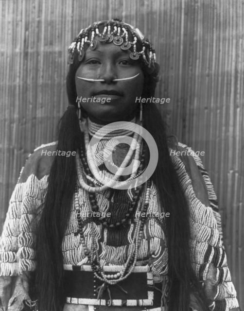 Wishham (i.e., Wishram) girl, c1910. Creator: Edward Sheriff Curtis.