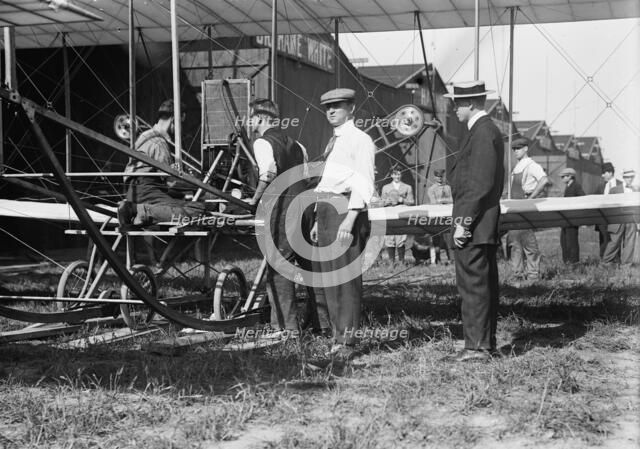 W.R. Kimball & aeroplane, between c1910 and c1915. Creator: Bain News Service.
