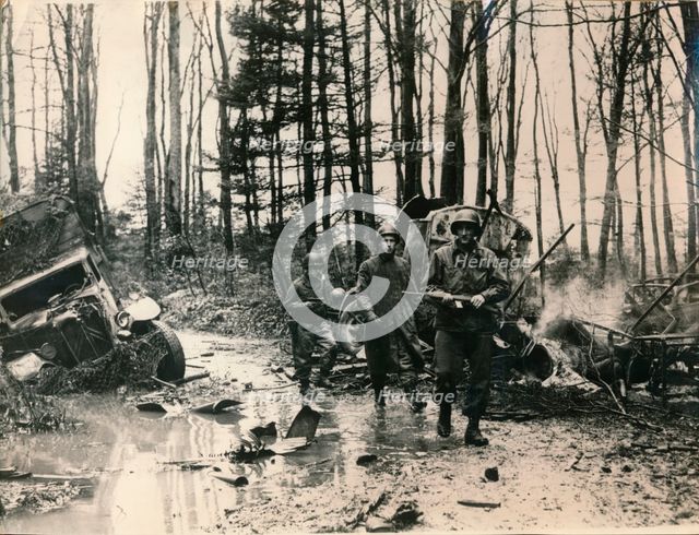 Wrecked German vehicles in a forest on the road to Saverne, November 1944. Artist: Unknown