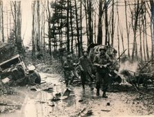 Wrecked German vehicles in a forest on the road to Saverne, November 1944