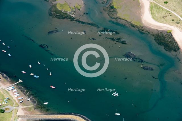 Wrecks on the mud flats at Amble-by-Sea, Northumberland, 2018. Creator: Emma Trevarthen.