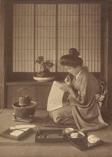 Writing a Letter, 1904-1910. Creator: Herbert Ponting