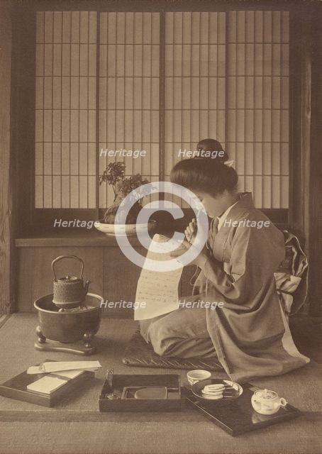 Writing a Letter, 1904-1910. Creator: Herbert Ponting.