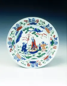 Wucai saucer with immortal and attendants, Wanli period, Ming dynasty, China, 1572-1620. Creator: Unknown