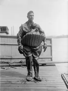 T. Aud in Life Saving Suit, 1916. Creator: Harris & Ewing