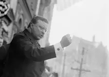 T. Roosevelt speaking, gesticulating with fist, outside, Yonkers, NY, 1910. Creator: Bain News Service