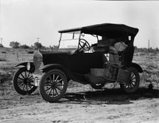 To serve the crops of California, thousands of families live on wheels, near Bakersfield, CA,1936. Creator: Dorothea Lange