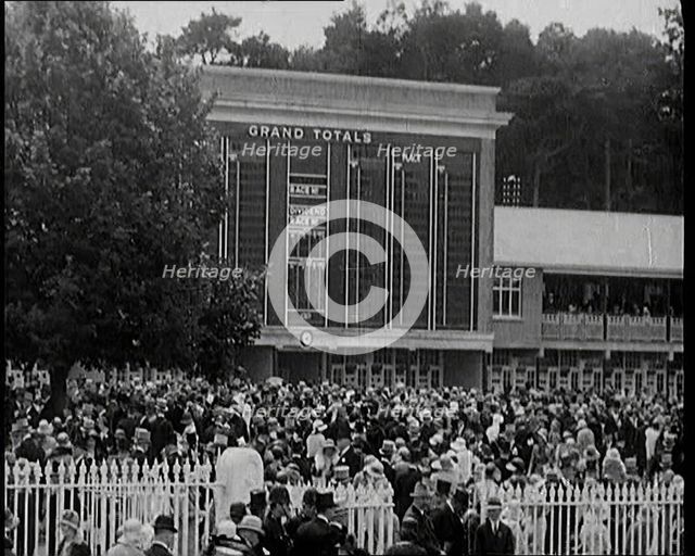 Totaliser/Tote Board at a Crowded Horse Racing Track, 1931. Creator: British Pathe Ltd.